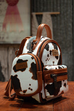 Load image into Gallery viewer, Wrangler: Cowprint Mini Backpack
