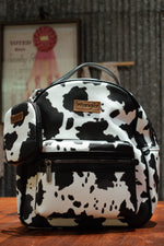 Load image into Gallery viewer, Wrangler: Cowprint Backpack
