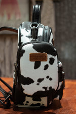 Load image into Gallery viewer, Wrangler: Cowprint Mini Backpack
