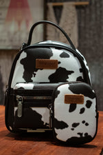 Load image into Gallery viewer, Wrangler: Cowprint Mini Backpack
