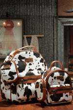 Load image into Gallery viewer, Wrangler: Cowprint Mini Backpack
