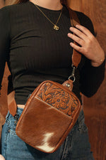 Load image into Gallery viewer, Trinity Ranch Cowhide Tooled Sling Bag
